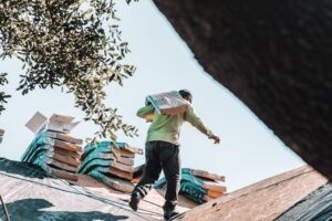 Roofer working on a roof.