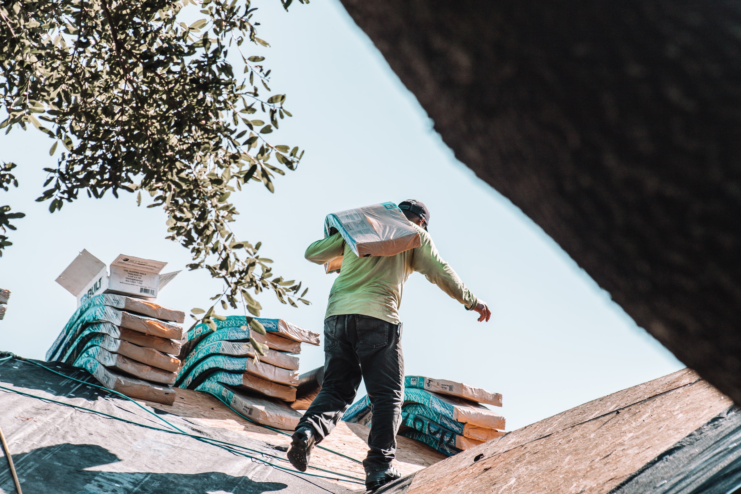Roofer working on a roof.