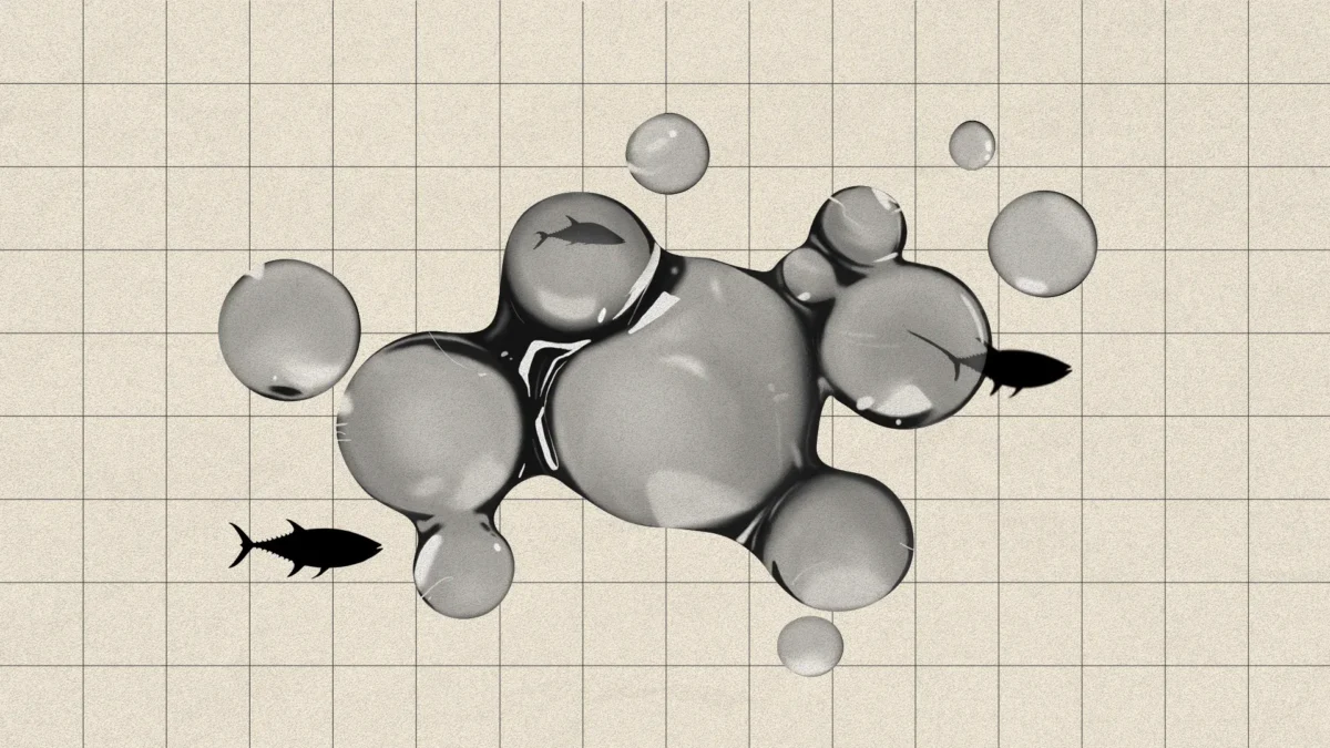 Picture of a splatter of liquid mercury surrounded by a few fish--Mercury