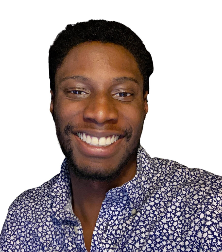 Osasenga Idahor, a young man in a collared shirt, smiles at the camera in front of a white background