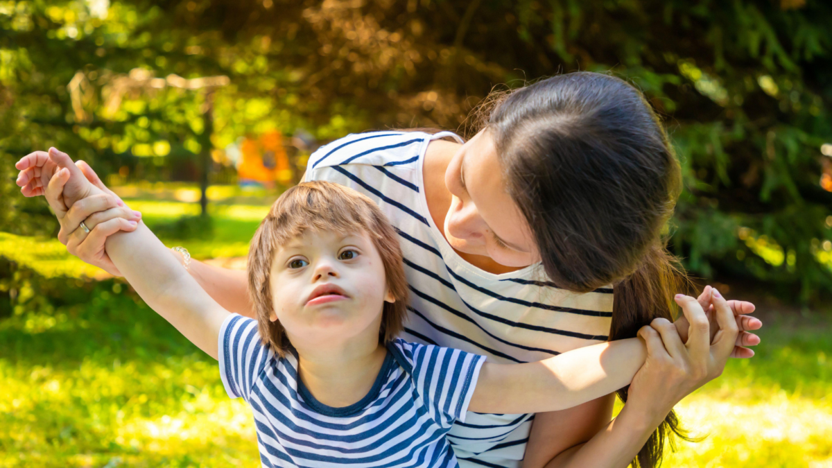 Adult woman and child standing together outside -- Rhode Island children's environmental health