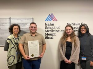 CEH Day partners stand with a proclamation